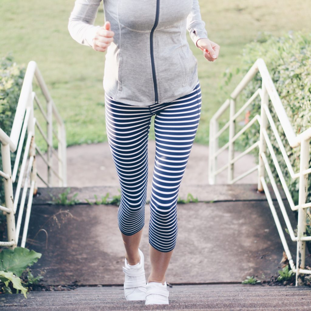 Athleta striped capri workout pants, track jacket and white velcro sneakers