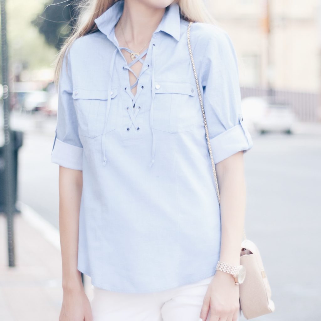 $25 blue lace up collared shirt and $30 stain resistant white skinny jeans