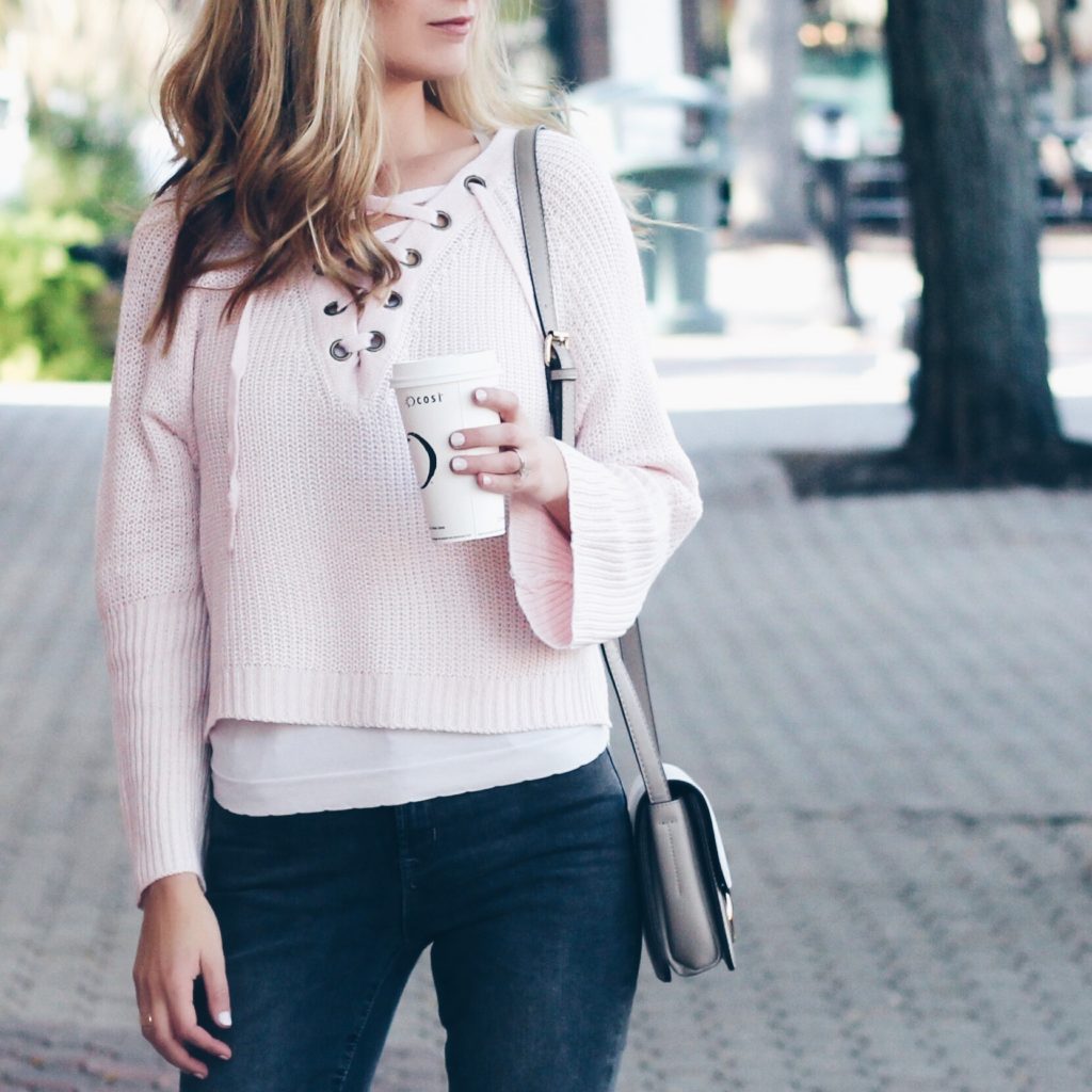 Connecticut life and style blogger, Pinteresting Plans shares a pink lace-up sweater and gray lace-up shoes for an easy fall outfit.