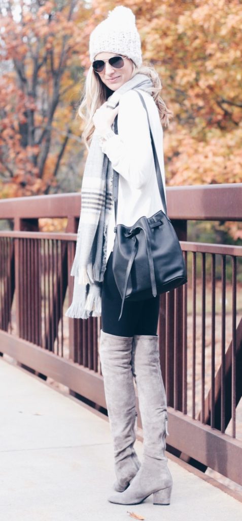 fall outfit: over the knee boots and white turtleneck sweater with knit hat and plaid scarf
