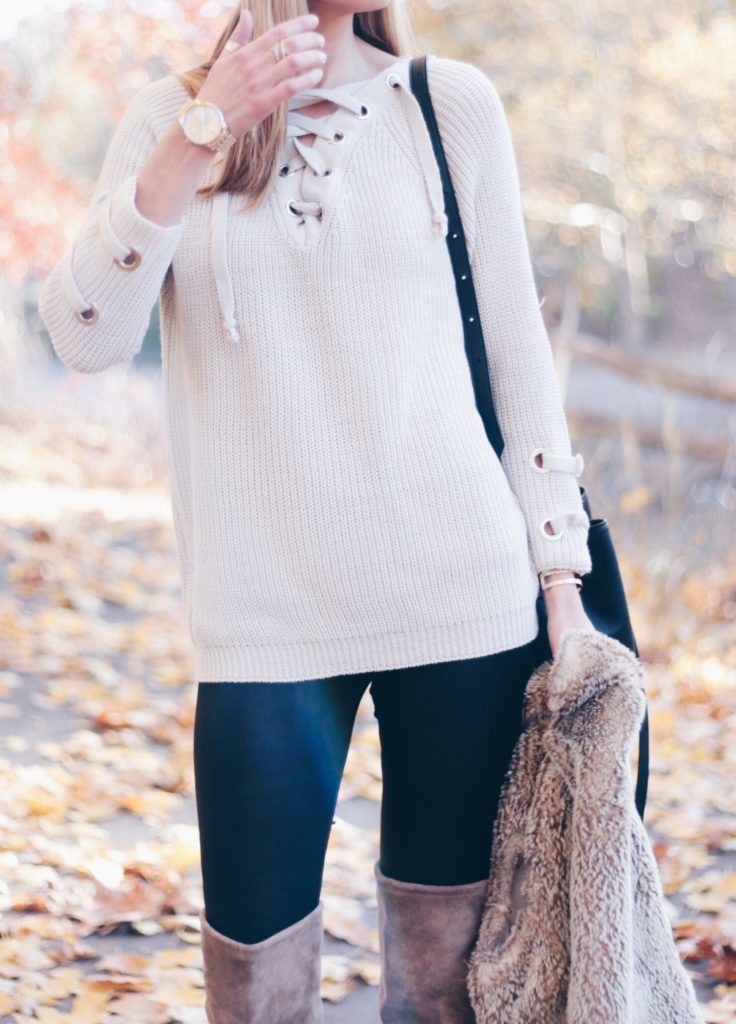 Connecticut life and style blogger, Pinteresting Plans shares a holiday out complete with lace-up sweater, fur vest, and over the knee boots.