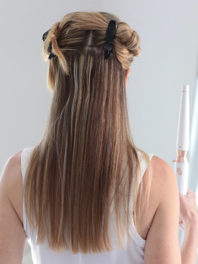 Connecticut life and style blogger, Pinteresting Plans shares a picture tutorial of how to achieve loose curls using the T3 tapered wand on straight hair.