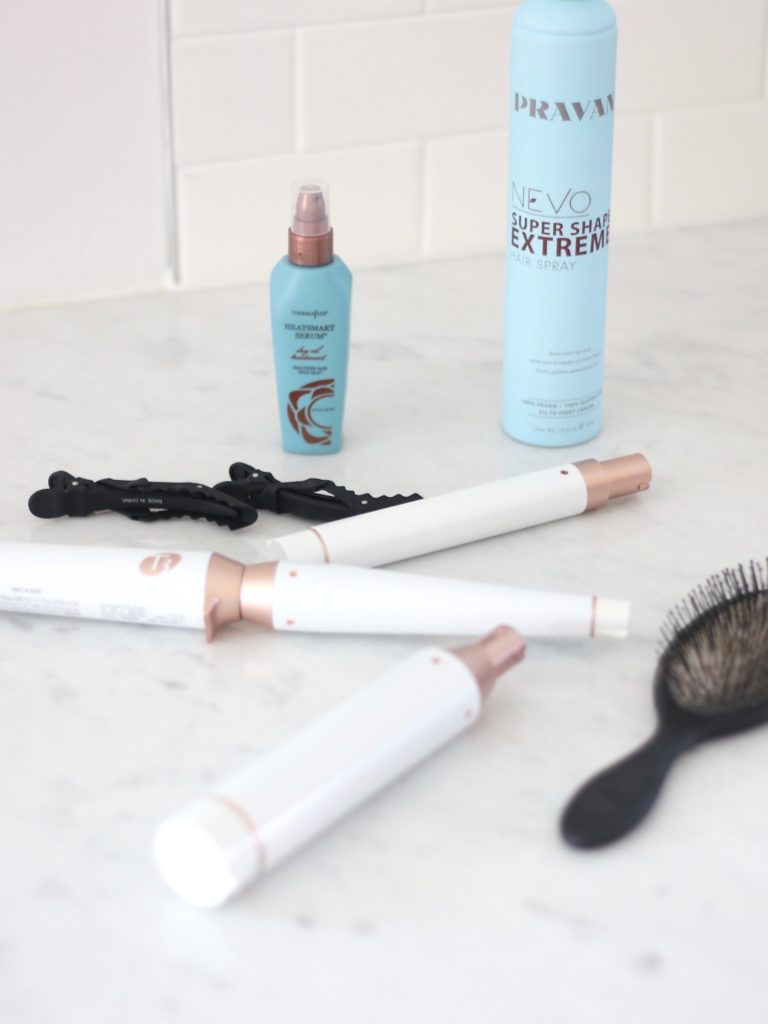 Connecticut life and style blogger, Pinteresting Plans shares a picture tutorial of how to achieve loose curls using the T3 tapered wand on straight hair.