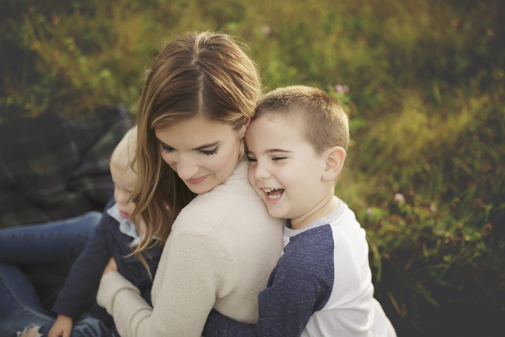 family photo shoot fashion - styling mom and boys for a family photo