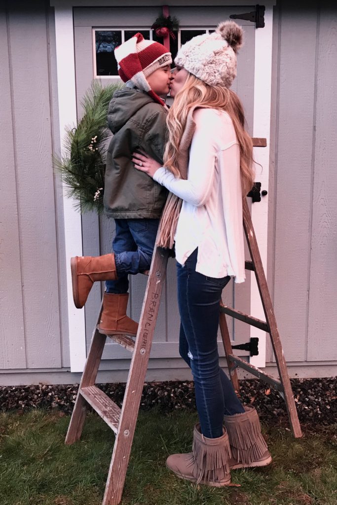 favorite boys names 2017 and mom and son decorating for christmas in koolaburra boots