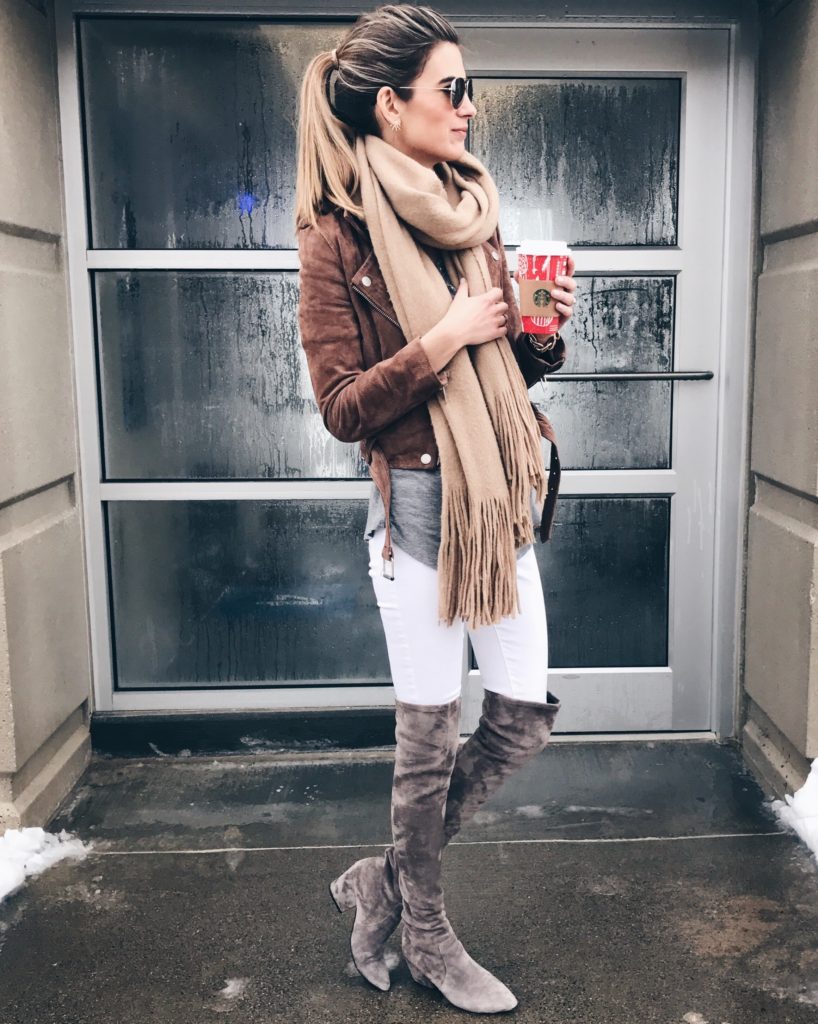 suede moto jacket outfit - white skinny jeans and gray over the knee boots