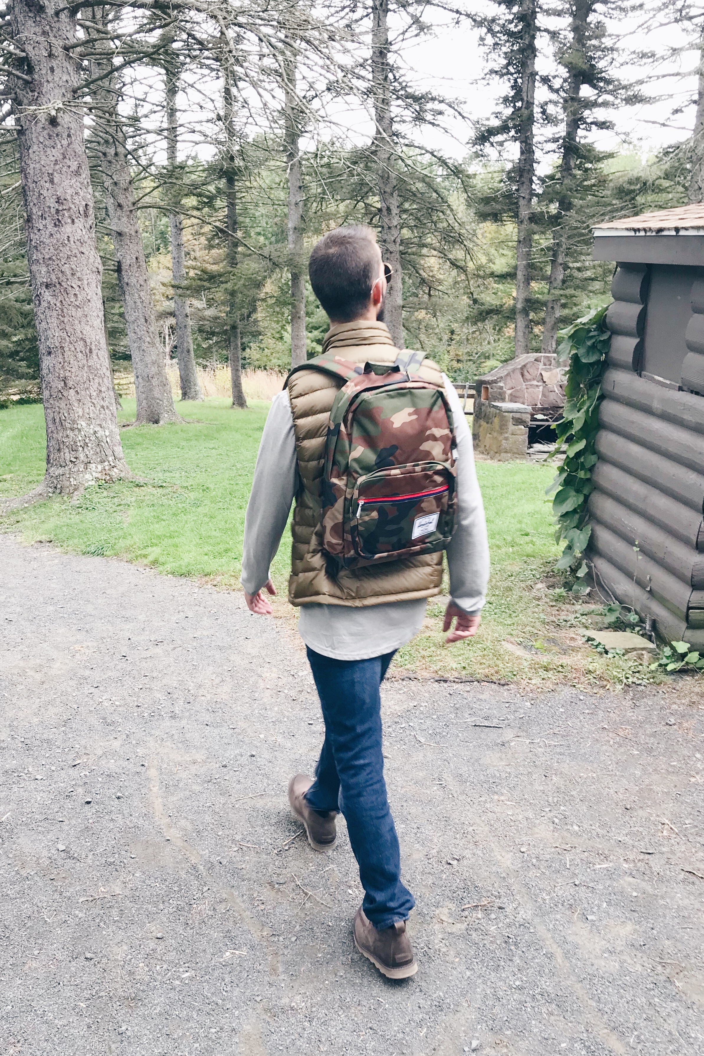  fall activities for kids in connecticut - man in camo backpacking hiking
