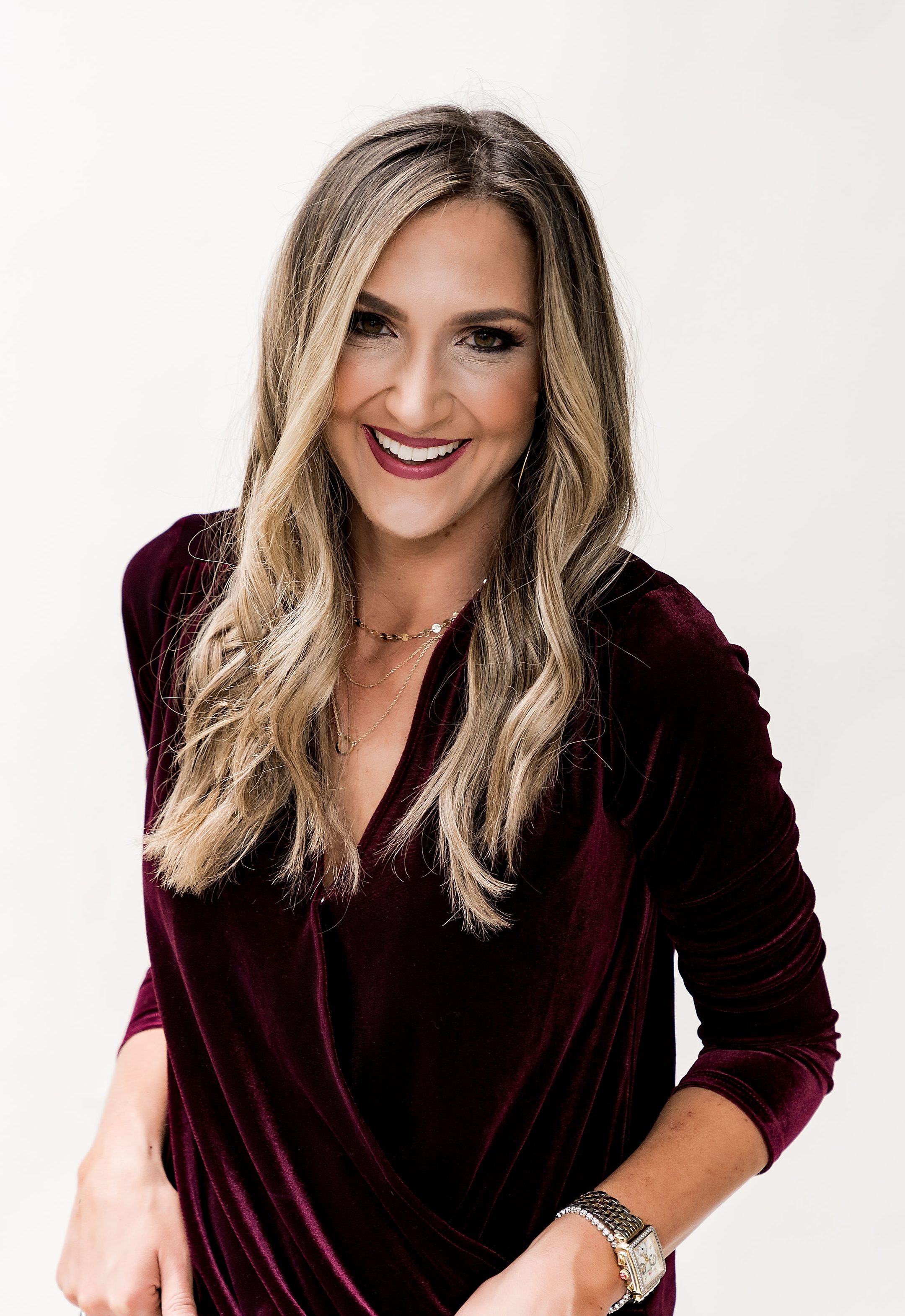  gibson glam holiday outfit ideas - the MALLORY velvet wrap top in burgundy