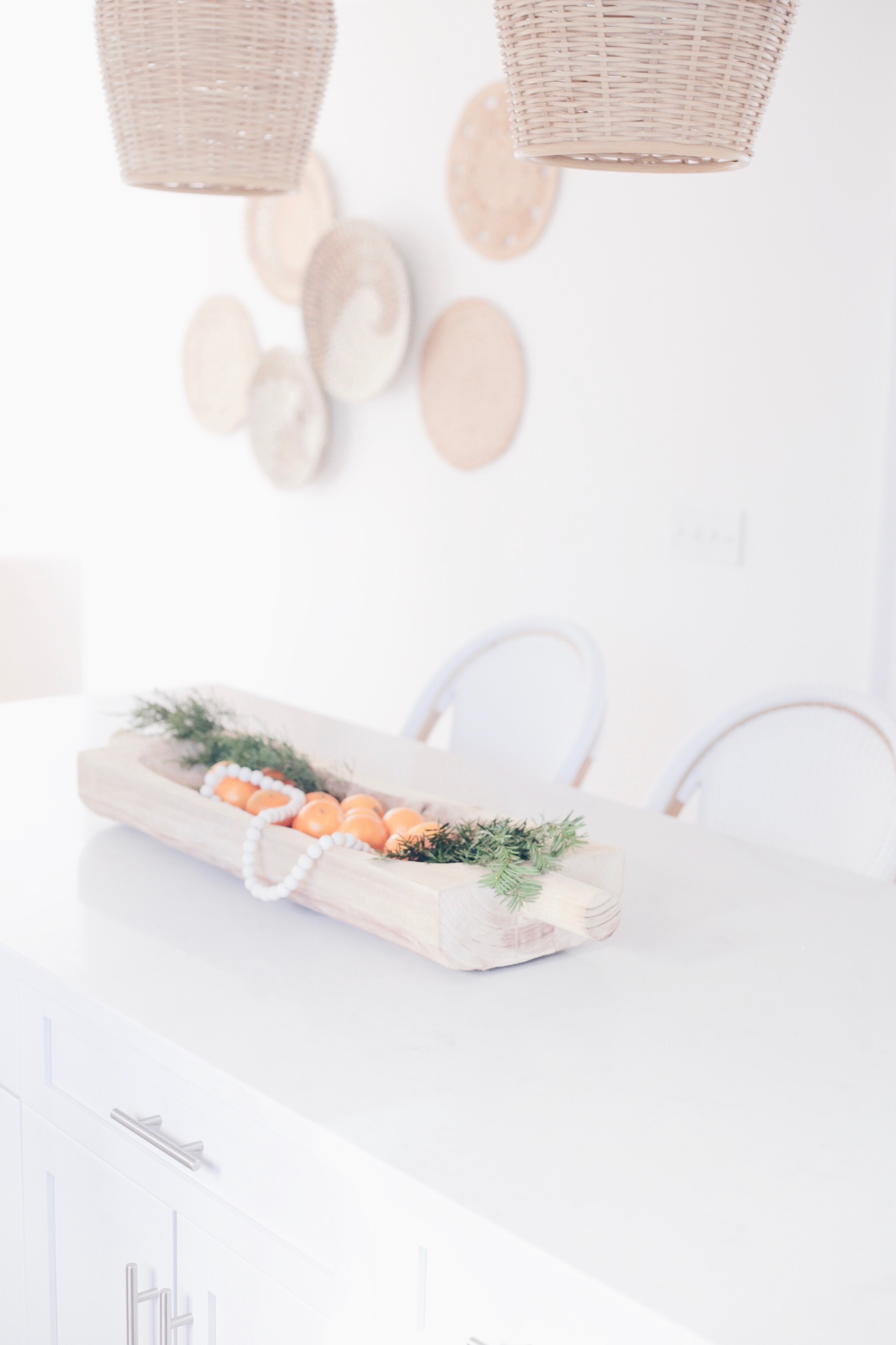  winter home decor in the kitchen - large wood tray on kitchen island on pinteresting plans lifestyle blog