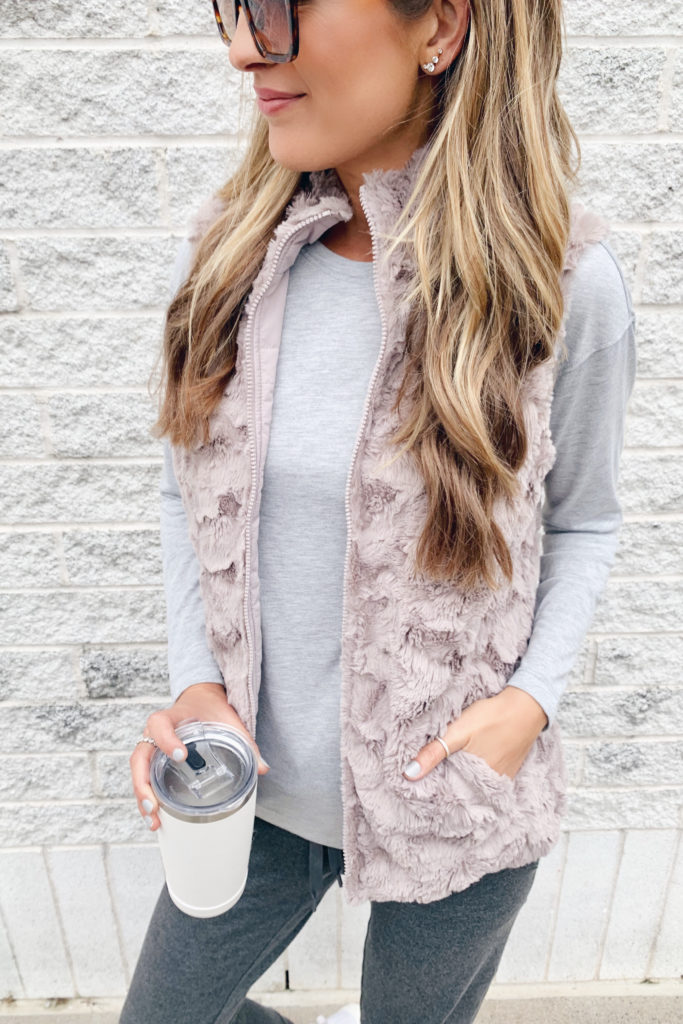 fashion blogger wearing jockey reversible faux fur vest