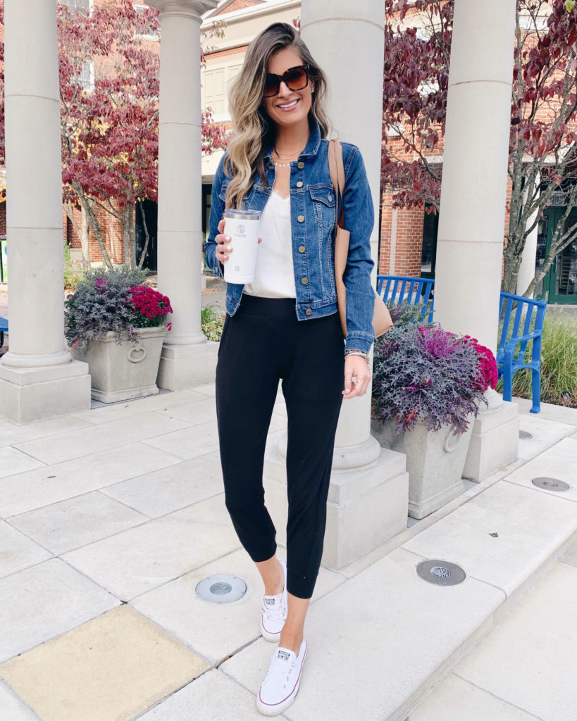 norstrom sanctuary kyle crop denim jacket with white lace cami black joggers and converse sneakers