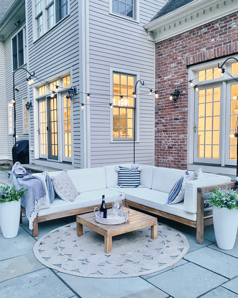 diy patio string lights and artificial flower planters