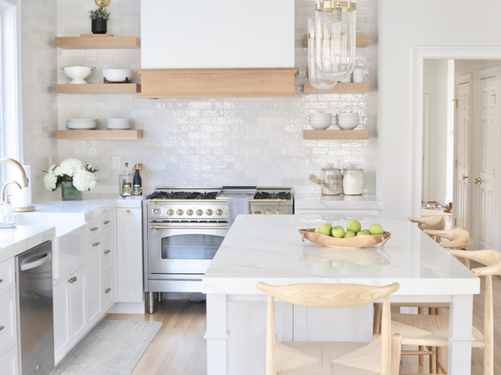 WHITE AND WOOD KITCHEN REMODEL REVEAL - Pinteresting Plans; Click here to see this kitchen remodel reveal on Pinteresting Plans! I am finally sharing the details of our kitchen remodel. We gutted our kitchen for a major kitchen remodel with island. Kitchen ideas remodeling budget small. Kitchen remodel on a budget small diy. Kitchen remodel before and after layout open concept. Modern kitchen ideas contemporary white wood. Kitchen decor ideas themes color schemes gray. Kitchen remodel ideas layout renovation. 