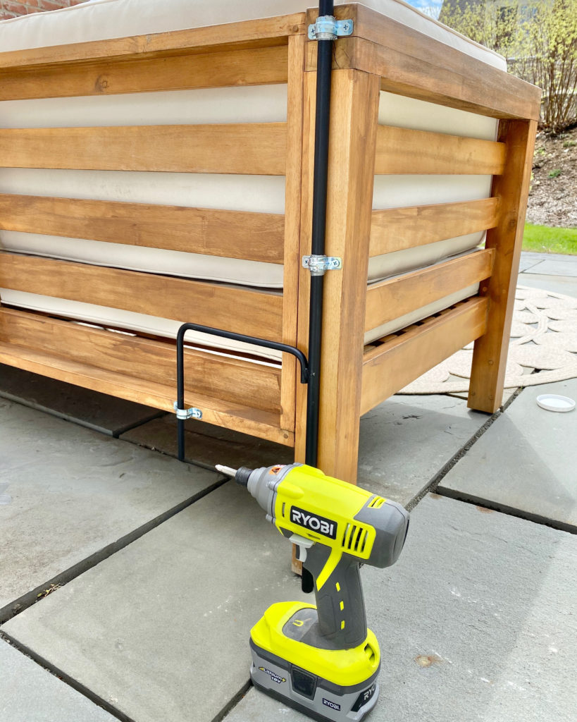 mounting poles to hang solar string lights on a patio - pinteresting plans blog